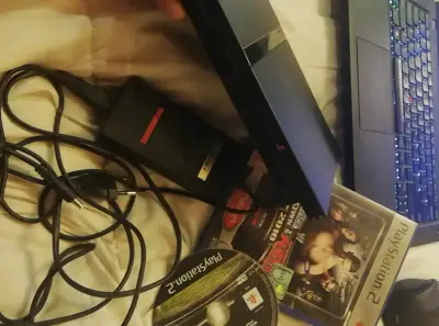Sony PlayStation 2  fara manete cu doua jocuri