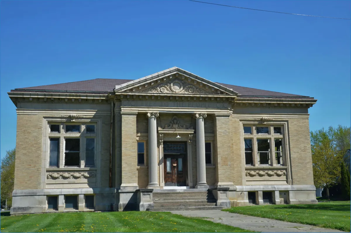 Historic brick library building with columns