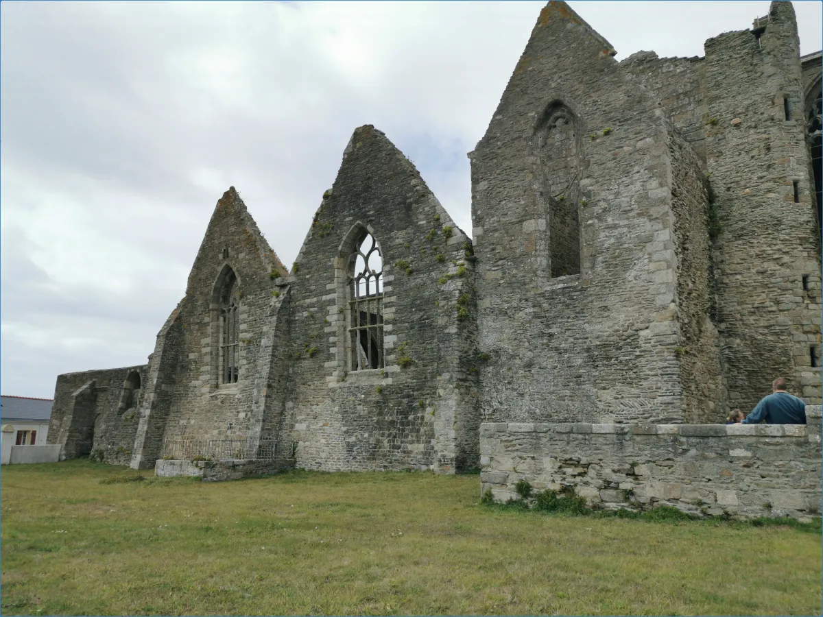 Ruins of an old stone building with arched windows