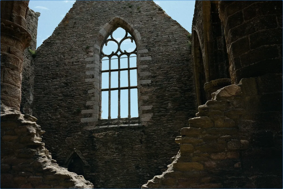 Ruined stone building with arched window