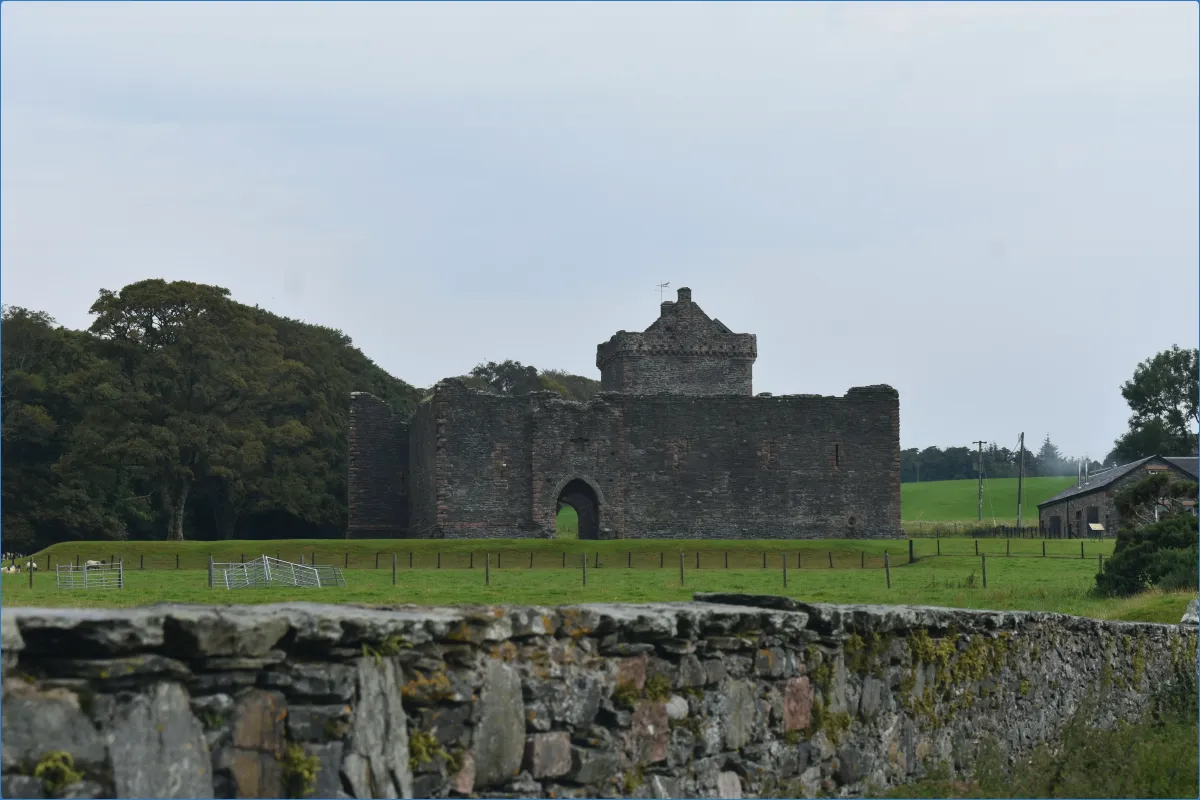 Stone castle with surrounding greenery