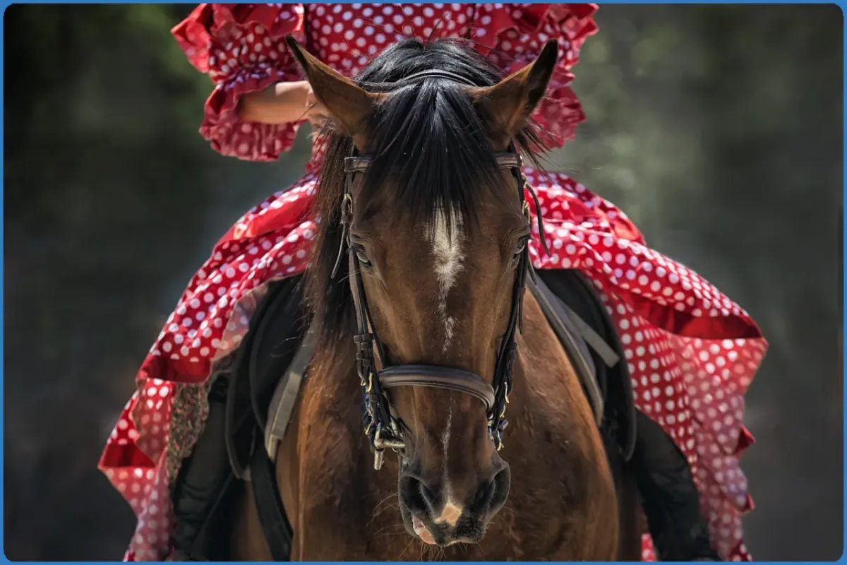 Horse with rider in red polka dot dress