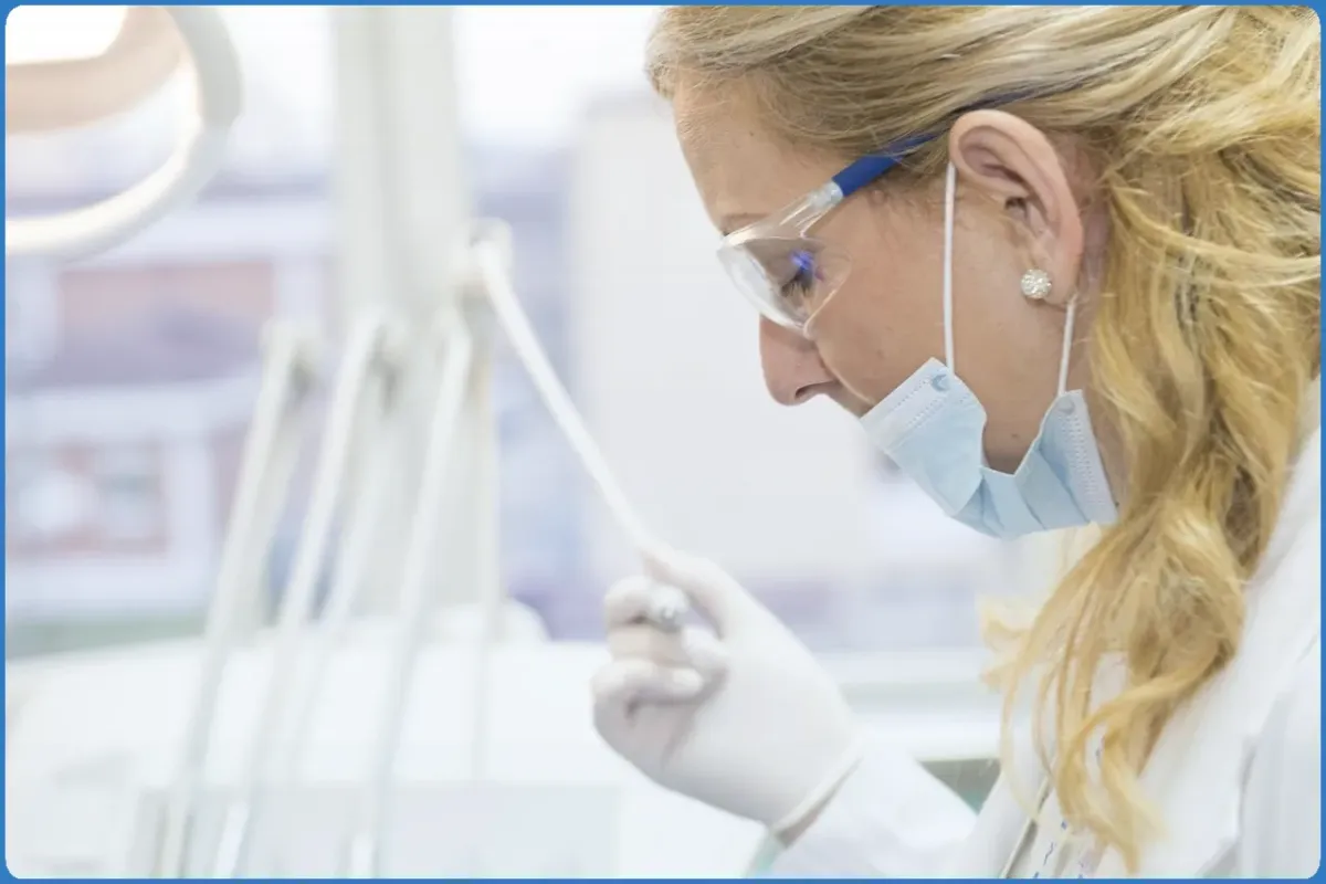 Female scientist wearing protective gear in a lab