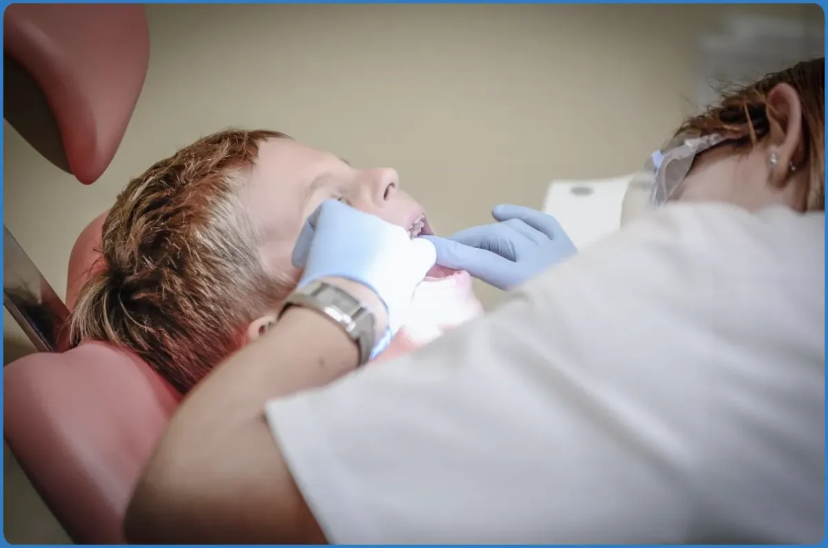 Child receiving dental checkup