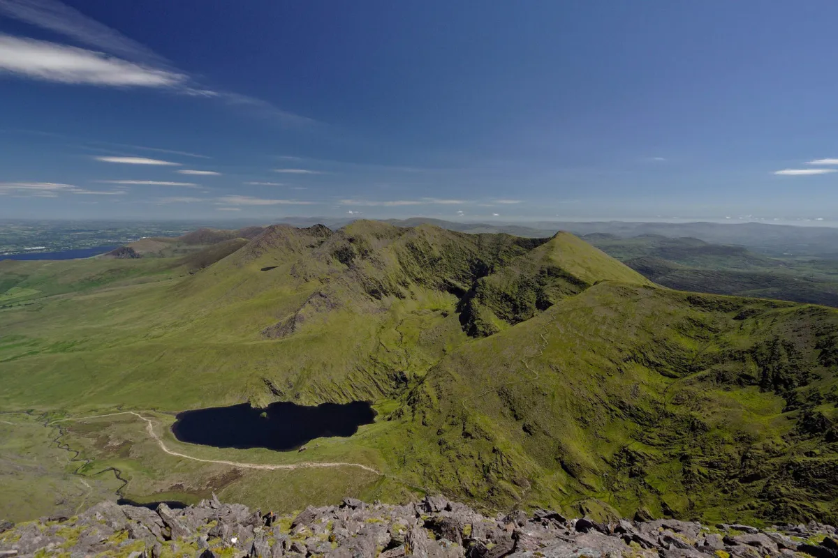 Mountain landscape with a lake and blue sky