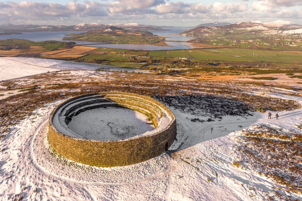 Aerial view of a stone fort on a snowy landscape.