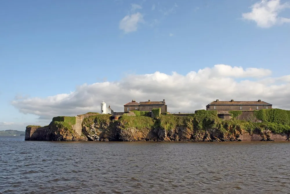 Island with buildings and a lighthouse