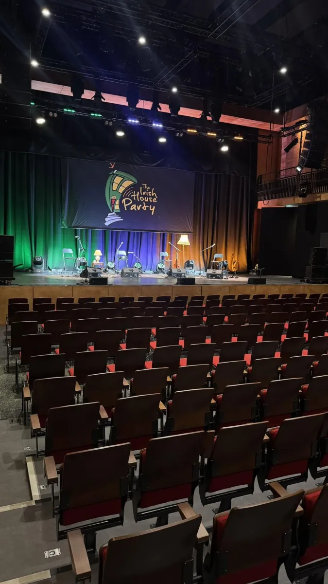 Empty theater with stage set for performance