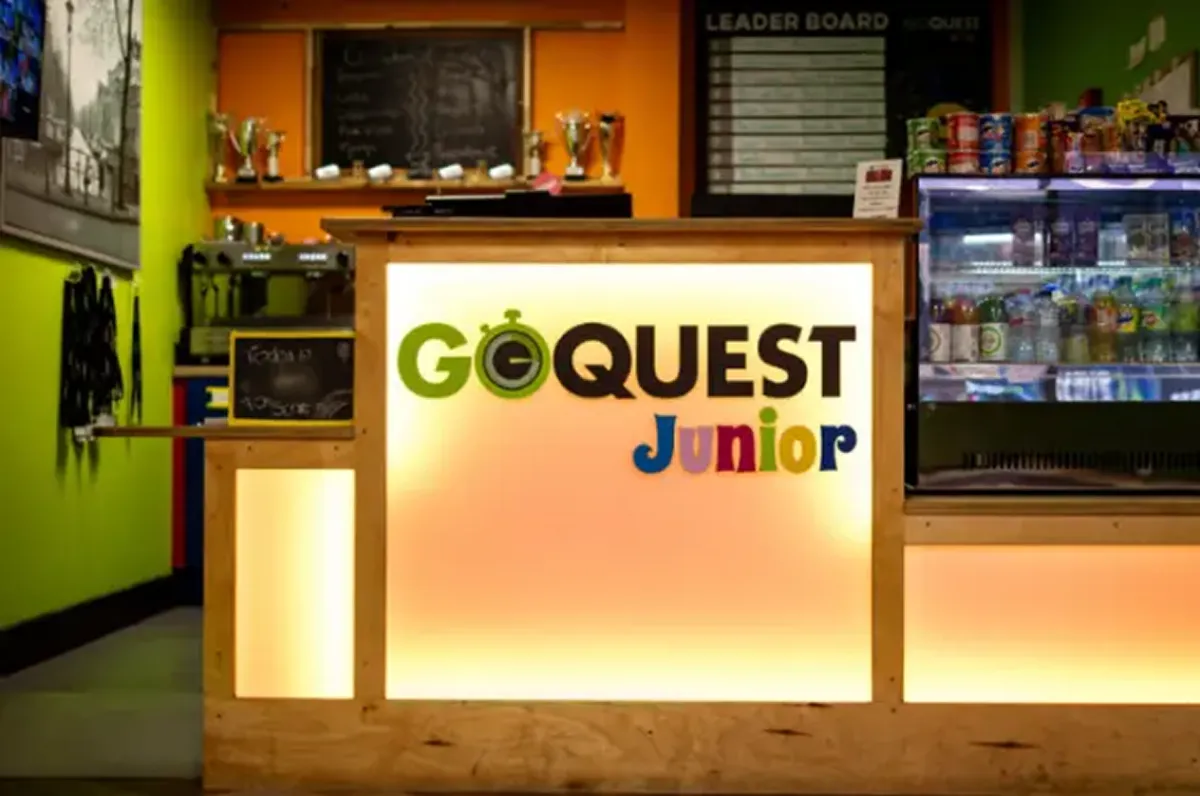 GoQuest Junior reception desk with snacks and drinks.
