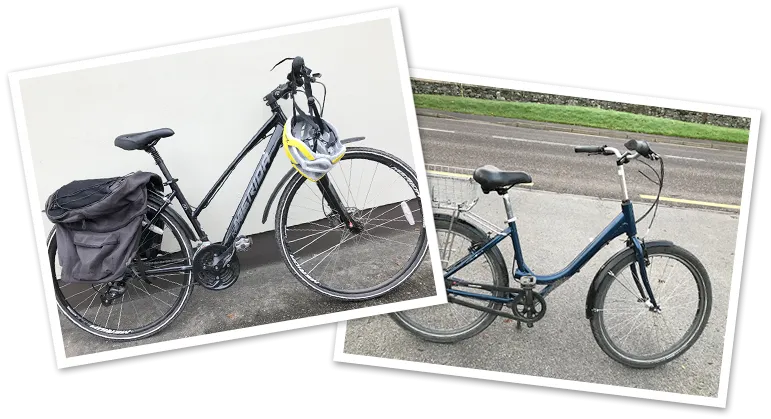Two bicycles, one with a helmet and bag.