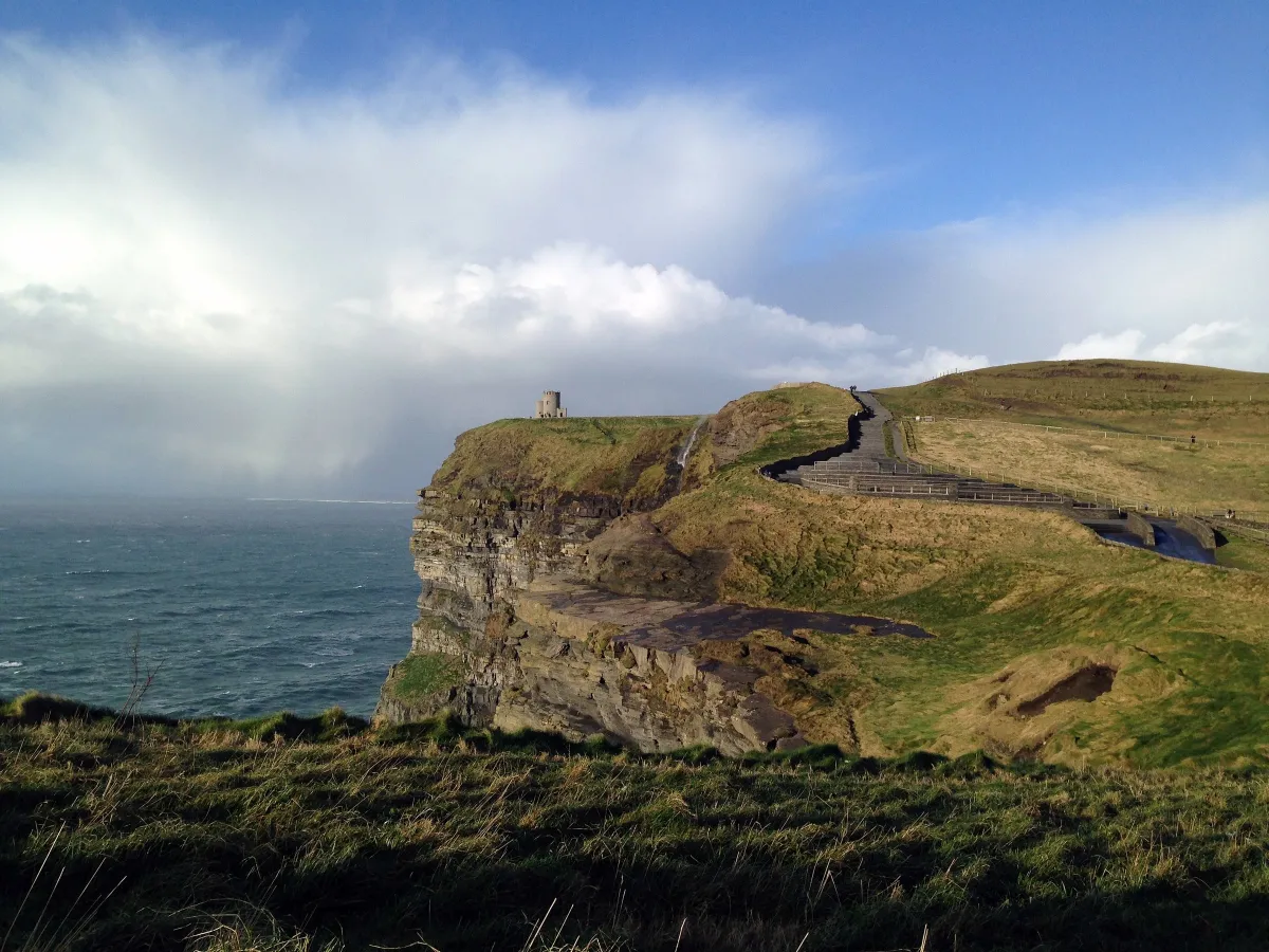 Cliffside with ocean view and tower