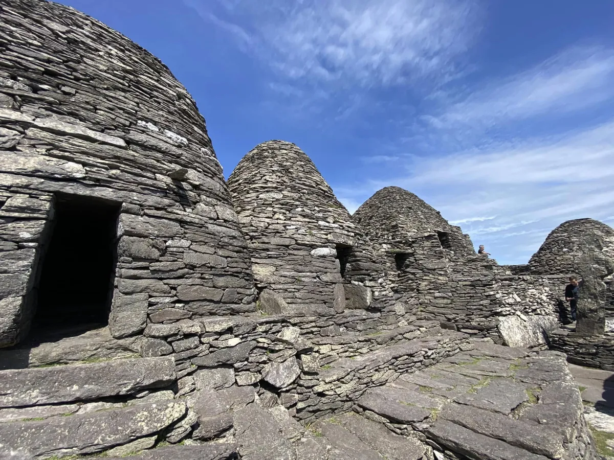 Ancient stone beehive huts (clocháns) on Skellig Michael monastery in Ireland