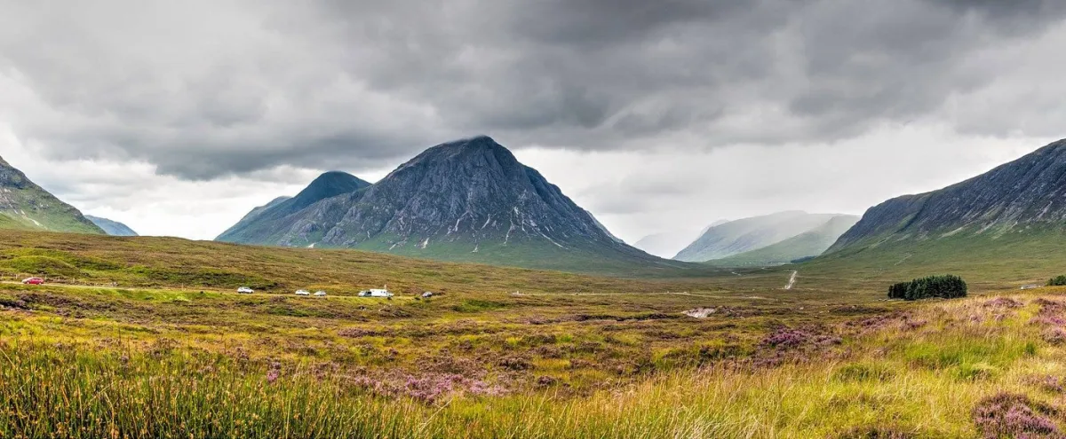 Scenic mountain landscape with cloudy sky