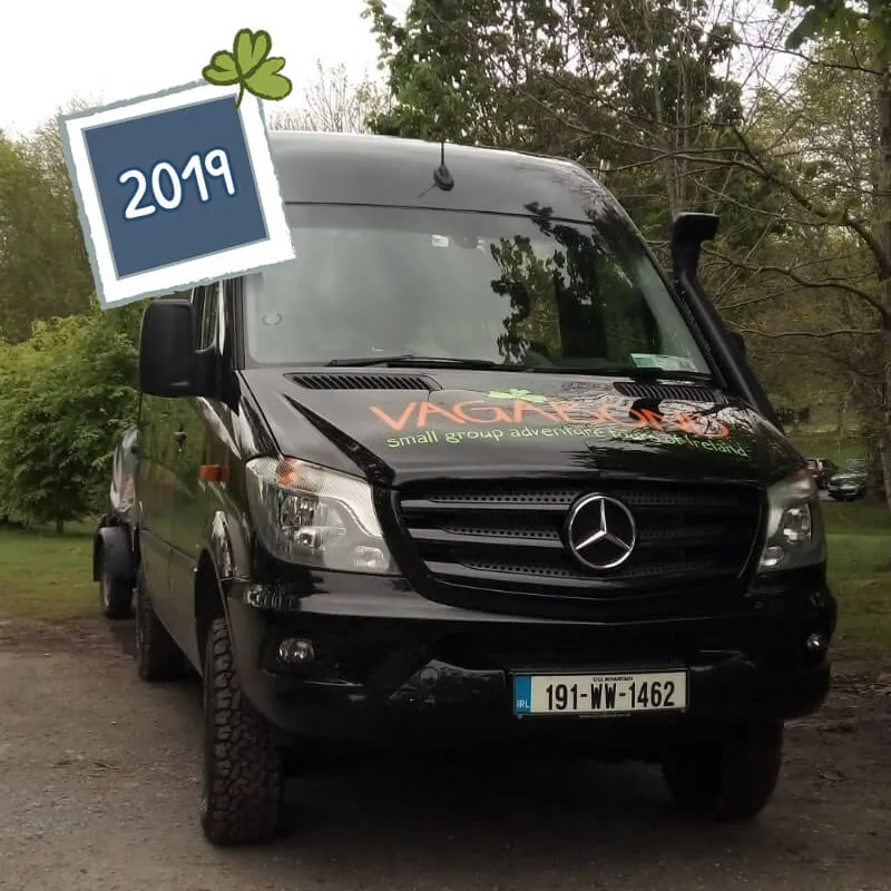 Black tour van with 2019 sticker
