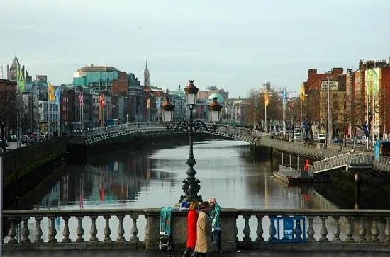 View of Ha'penny Bridge over the River Liffey in Dublin.