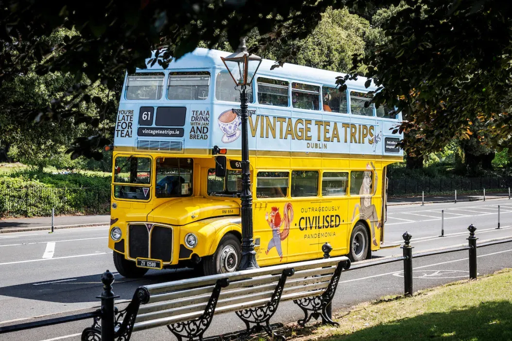 Yellow vintage double-decker bus in Dublin.