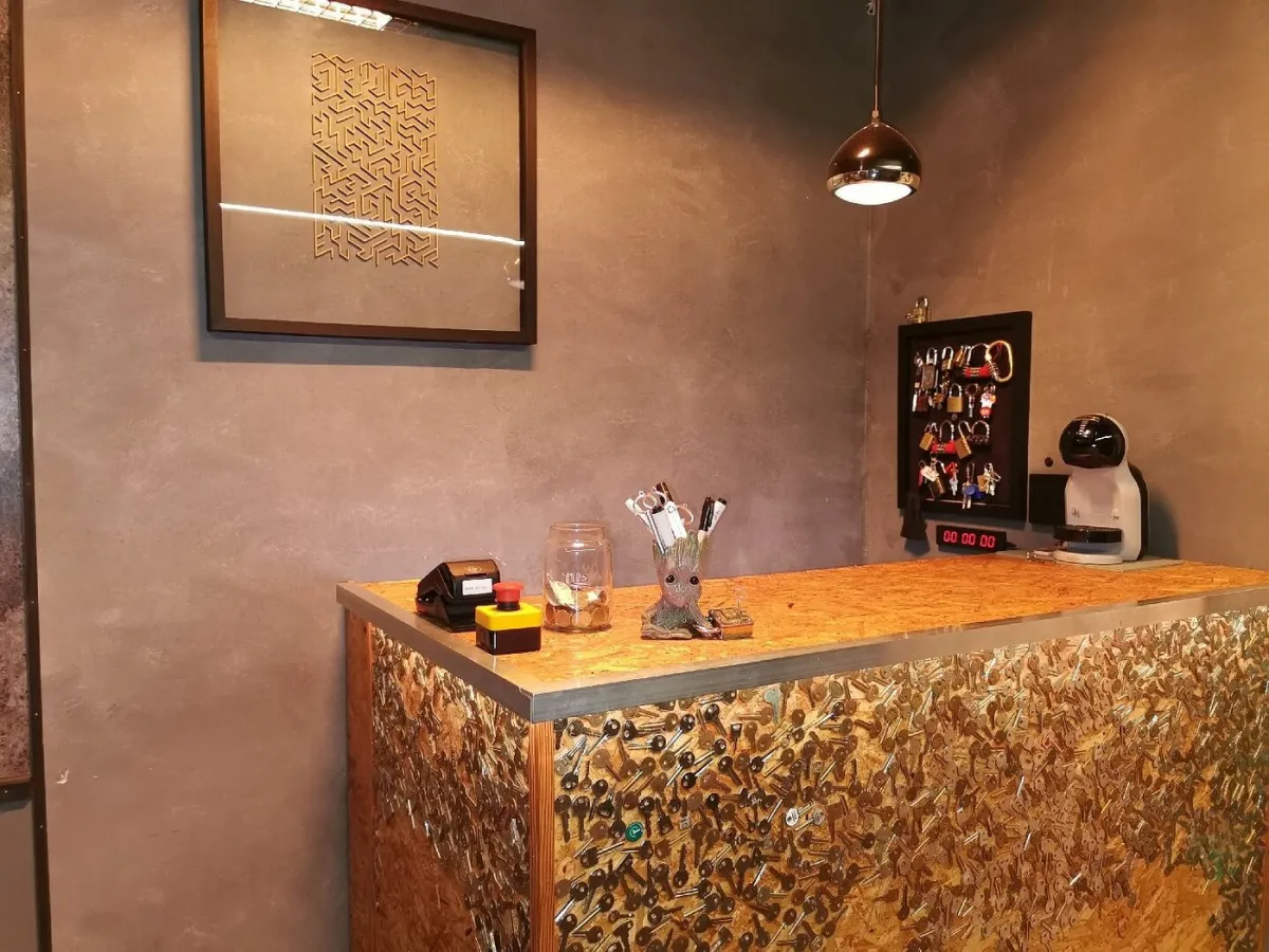 Reception desk with decor and wall art.
