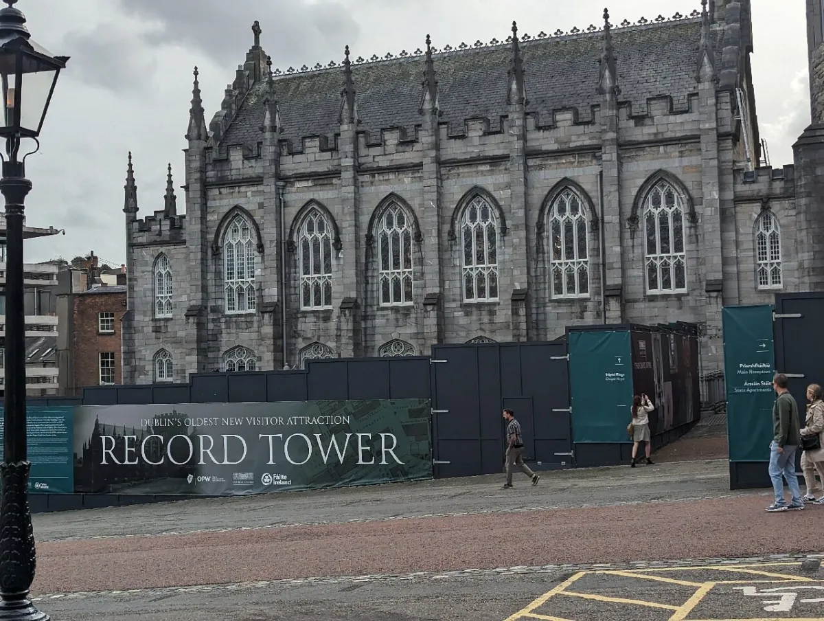 Historic building with gothic architecture and sign for Record Tower.