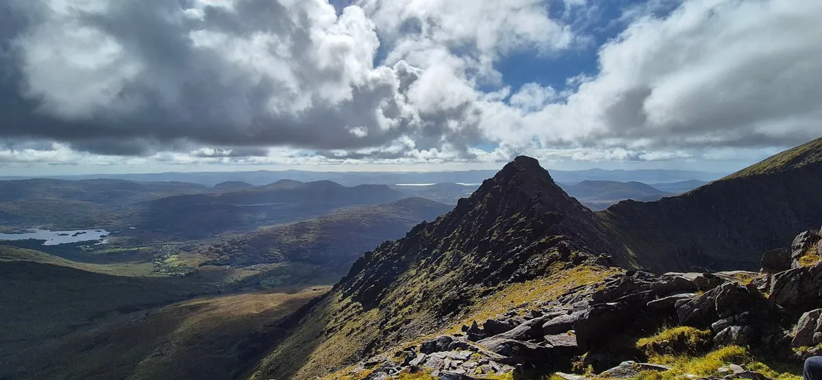 Mountain peak under cloudy sky