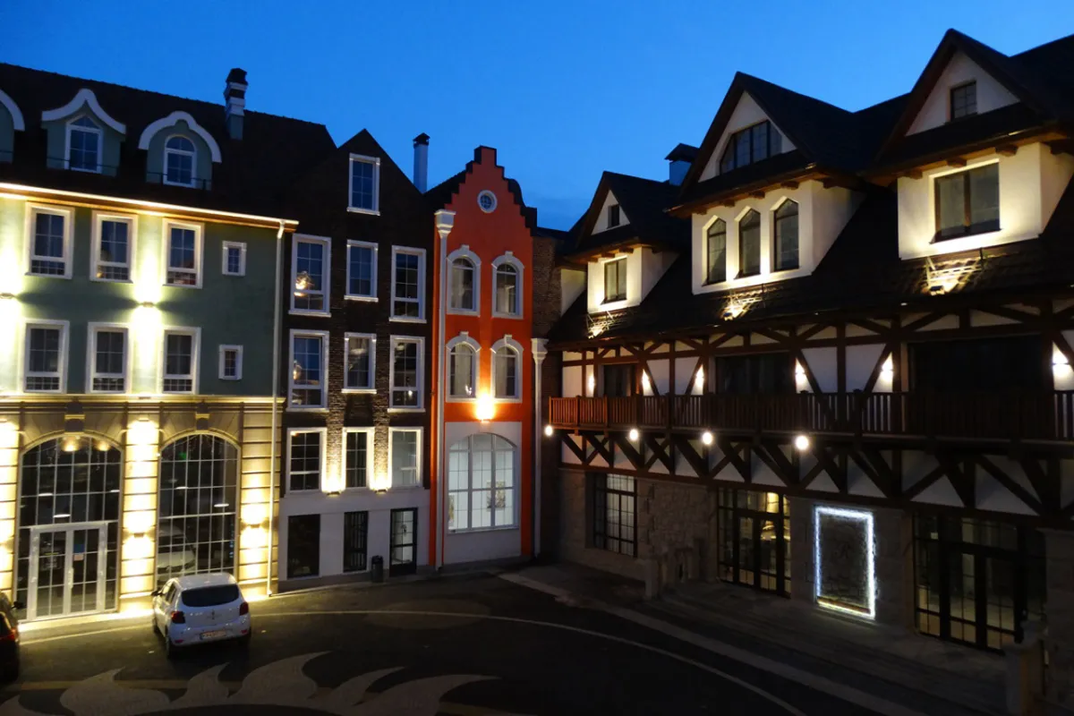Illuminated European-style buildings at dusk