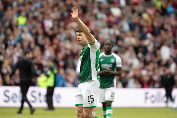 Footballer Kevin Nisbet of Hibernian waving to the crowd after the recent Edinburgh Derby.