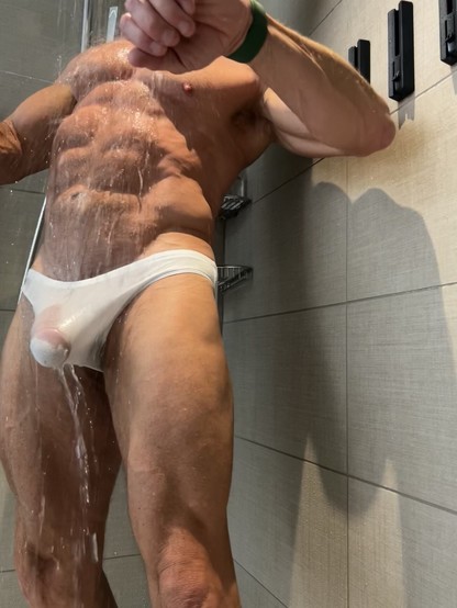 A Man enjoying shower.