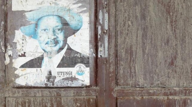 Image: Facade with Poster of President Yoweri Museveni - Outside Kisoro - Southwestern Uganda by Adam Jones via Flickr (CC BY  2.0)
