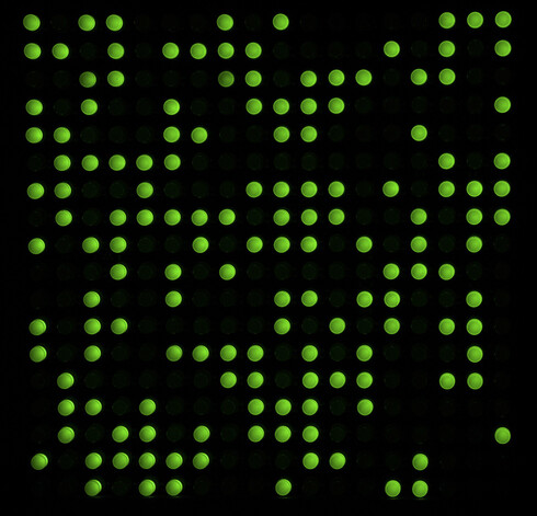 Static shot of the Super-Computron 4500 retro-supercomputer light toy/prop, built from a kit I sell on Etsy.

It is a grid of 18x18 slow-flashing LEDs that create constantly morphing patterns that fool the mind into thinking there's something deeper going on.  Available in a choice of colours, this one is green.