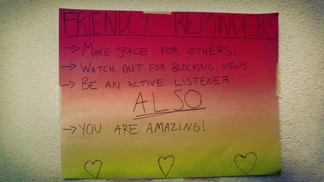 A brightly-colored ground rules wall poster at the lost levels conference. It says: "FRIENDLY REMINDERS MAKE SPACE FOR OTHERS. WATCH OUT FOR BLOCKING VIEWS BE AN ACTIVE LISTENER ALSO YOU ARE AMAZING!"