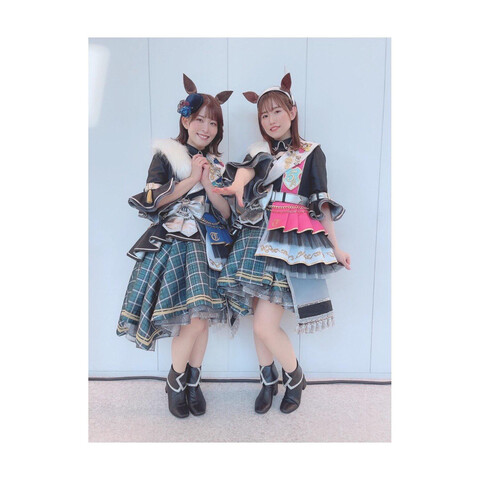 Manaka with Ikumi in their stage outfits.