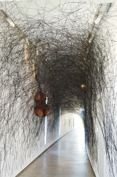 I thought that I would share some artwork by #ChiharuShiota for #silentsynday this is  a remarkable  #installation called ‘State of Being’ from the TarraWarra Museum of Art, 2012 https://www.twma.com.au/exhibitions/chiharu-shiota-state-of-being/. The image is of an intricate web of black yarn with musical instruments including a double bass and a violin  attached to the  yarn. The installation  symbolises memories and existence.
