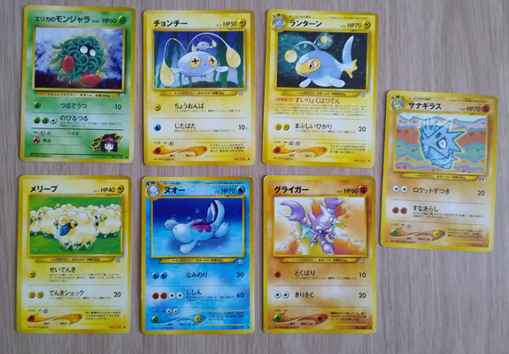 A selection of Japanese Pokémon cards featuring Tangela, Chinchou, Lanturn, Mareep, Quagsire, Gligar, and Pupitar