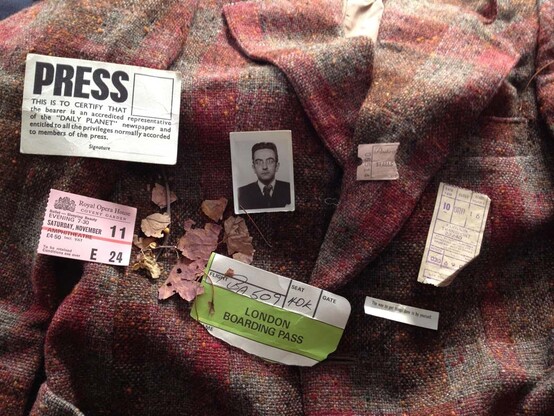 On a tweed jacket, one photo, a crumpled boarding pass, one ticket for the  bus, one for the ballet, a press pass for the 'Daily Planet'... poignant memories from the pockets. From 'Francis Golding, a life in clothes', an exhibition at the Museum of London, described in the link.