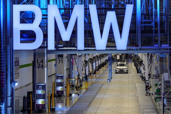 BMW i3 electric cars are seen on the assembly line at a BMW factory in Shenyang, China on 23 June 2022.