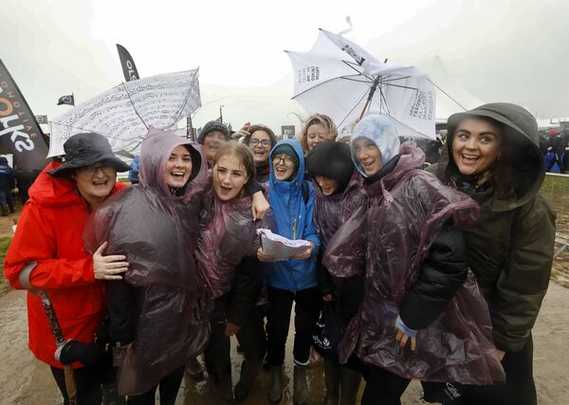The National Symphony Chorus braved the elements to perform at the official opening by President Michael D Higgins of the National Ploughing Championships. Picture: Mark Stedman
