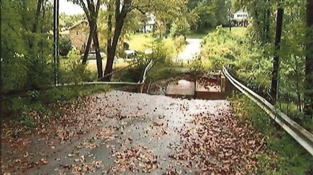 Collapsed bridge between two sections of a lane

 source: Wade County Court
