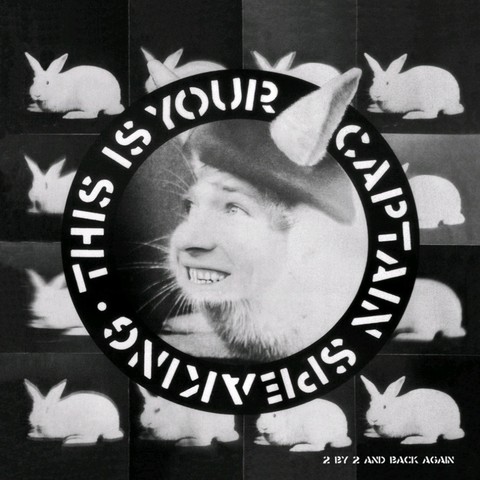 a punk rock collage of a rabbit with a face of man smiling and looking upwards within a ring saying "this is your captain speaking". The rabbit wears a beret. In the background there's a 4x4 grid with white rabbits. It's an album cover to Crass Records' Captain Sensible "This is your captain speaking" EP.