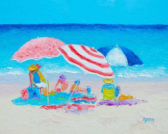 An impressionist beach painting of three colourful umbrellas facing the ocean. There is a family relaxing in beach chairs beneath the umbrellas, while two young children build sandcastles.