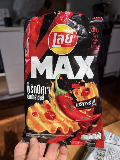 Photo of imported Thai Lay’s chips with hot chili peppers on the label