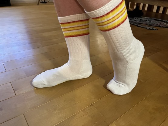 White tube socks with yellow and brown colored bands on the top - Famichiki colors