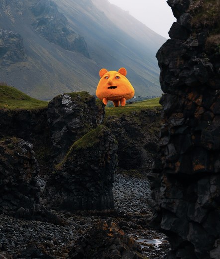 Photo of a rocky coastline where I’ve used generative AI tools to insert an orange monster at the top of a grassy cliff. 

This monster appears to be somewhat gumdrop shaped, with at least three legs. He has two ears on the top of his head, which look a little bit like this shape of Mickey Mouse his ears. He has a somewhat impish look on his face, as if he seen you do something he knows you weren’t supposed to have done.