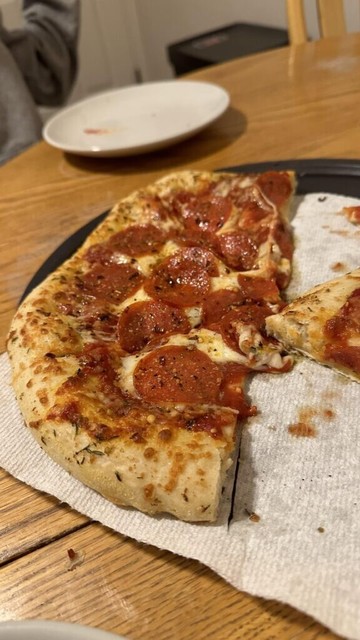Took a break from making pizza a while, my first one after a year didnâ€™t come out too bad!