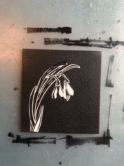 Inked lino with snow drop