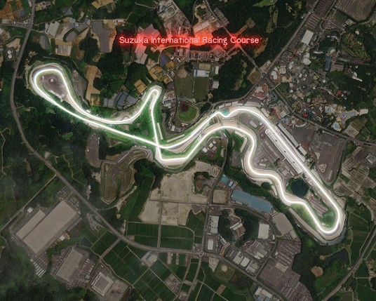 Suzuka International Racing Course lit up in a neon-style effect rendered over a satellite image.