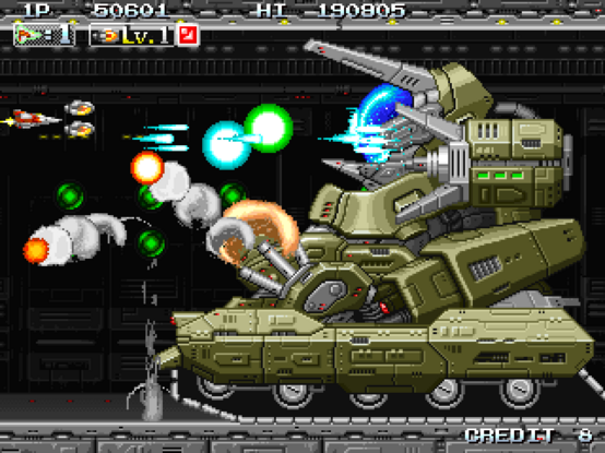 Player fighting against an enormous screen-filling green tank in INFINOS GAIDEN