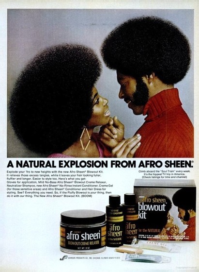 A cute couple forms a loving embrase while selling Afro Sheen hair care.