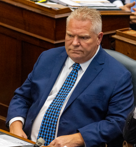Right-wing Premier of Ontario (province, Canada) Doug Ford, looking fat and unhappy.