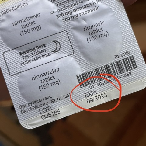 A close up photo of a blister pack of Paxlovid, with the expiration date circled in red. It express the same month it was prescribed (9/23).