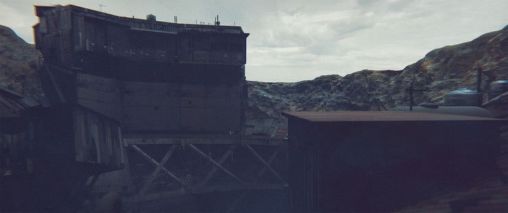 Wide shot, exterior, dusk - 

Looking across a crater that has been built up with various quick-and-dirty structures until the entire interior walls have been covered in a jumble of structures, girders and panels.