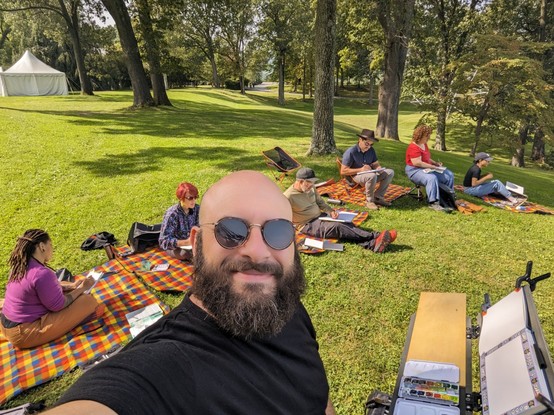 A selfie of myself and our friends at a plein air painting workshop at storm king